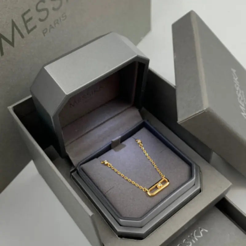 Messika gold necklace, single plain ring