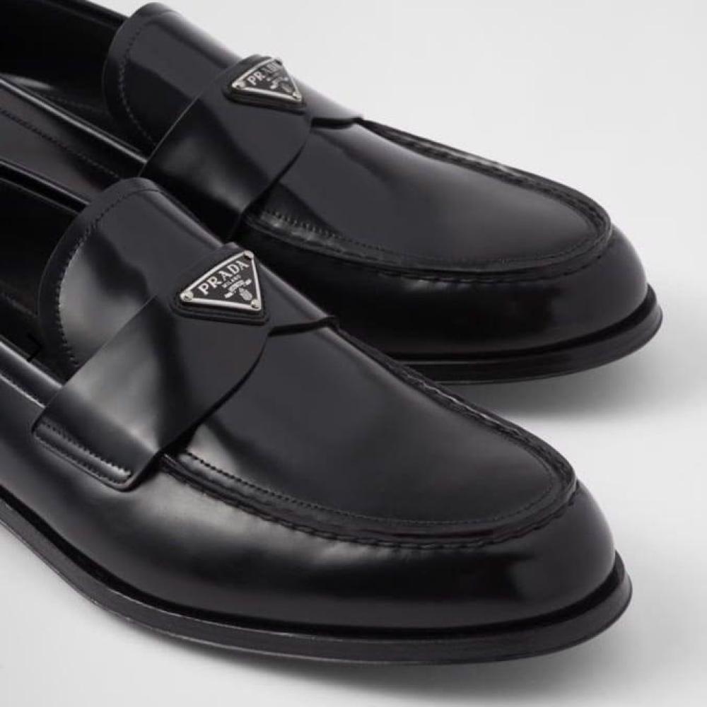 Prada Prada brushed leather loafers featuring a silver-tone enameled metal triangle logo - 4